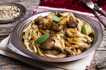 Fried oyster mushrooms with onions