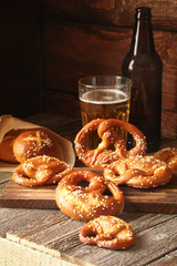 pretzels with sesame seeds and salt, fried cabbage, potatoes, shpikachki and beer