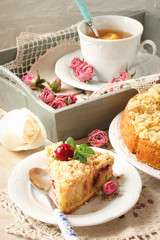 Cherry pie strasheim and walnuts on white plate