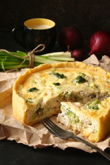 Homemade quiche with spinach, chicken and cream