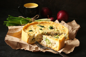 Homemade quiche with spinach, chicken and cream