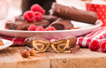 Chocolate rolls with hazelnuts and raspberries. 