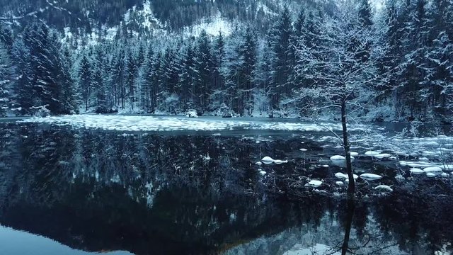 aerial flight over winter landscape in ebensee