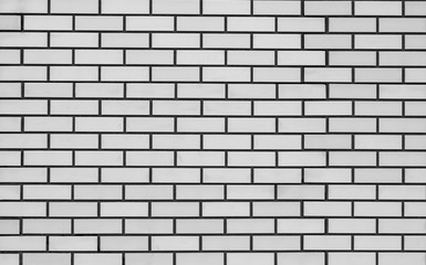 Texture of a colored brick with cement wall, close-up, abstract background for print design