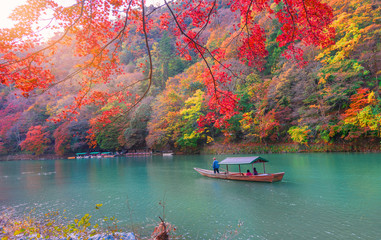  Katsura River with Boatman punting the boat for tourist .