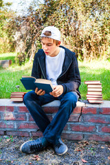 Fototapeta premium Teenager read a Book