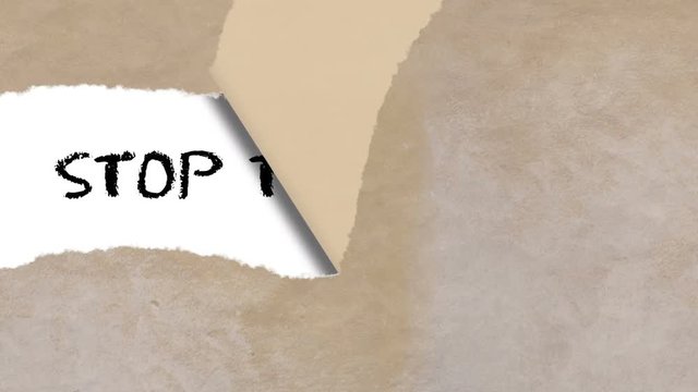 concept animation of torn paper with words stop terrorism