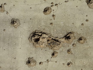 wall with bullet holes