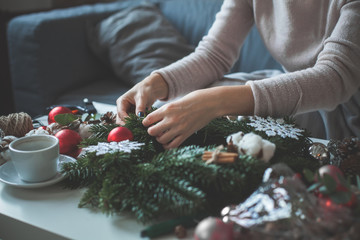 Florist's Hands Making Christmas Decorations