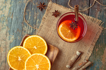 Christmas mulled wine on a rustic wooden table. Holidays concept.