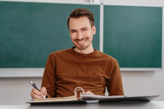 Happy male student with a confident smile