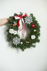 Fototapeta na wymiar Christmas Wreath with Xmas Tree, Glass Balls and Snowflake