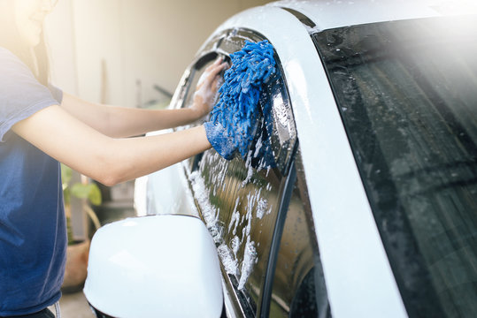 Fototapeta Car wash foam water,Cleaning Car at home