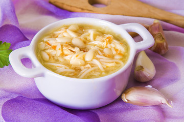 garlic soup with noodles and chicken