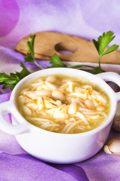 garlic soup with noodles and chicken