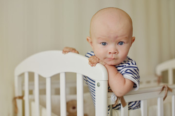 funny baby in the bed