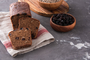 Homemade rye bread with raisins and sunflower seeds.