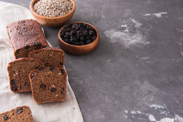 Homemade rye bread with raisins and sunflower seeds.