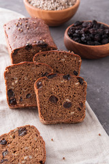 Homemade rye bread with raisins and sunflower seeds.