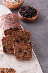 Homemade rye bread with raisins and sunflower seeds.