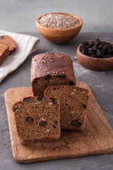 Homemade rye bread with raisins and sunflower seeds.