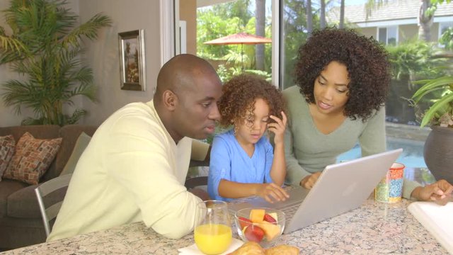 African American family  using laptop
