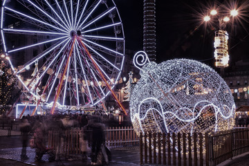 Christmas decorations and a big weel in George Square, Glasgow, Scotland.