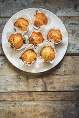 muffins in paper forms for baking - a delicious treat (cupcakes for dessert)