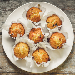 muffins in paper forms for baking - a delicious treat (cupcakes for dessert)