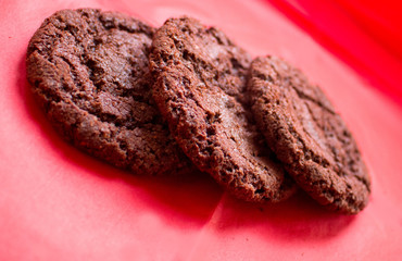 chocolate chip cookies on a red background