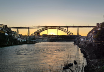 Large panoramic view on amazing sunset at Dom Luis I bridge, Porto. Portugal