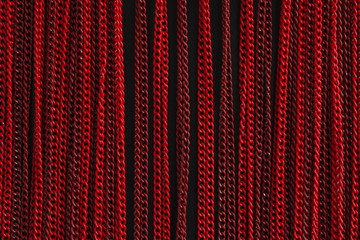 texture of a red chain on a black background
