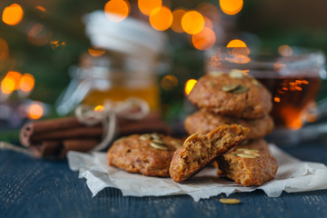 homemade cookies on the festive New Year's table, Christmas tree and garland