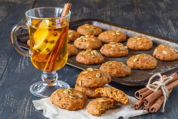 Christmas Cookies on Wooden background with Christmas Holly