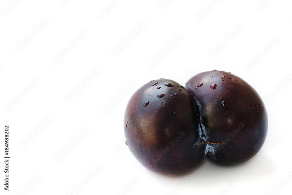 Wall mural double plum in the shape of buttocks isolated on white background