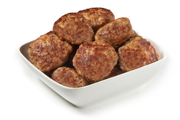 Grilled cutlets, fried meat balls, isolated on white background.