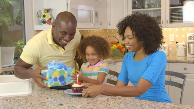 African American family  having birthday celebration