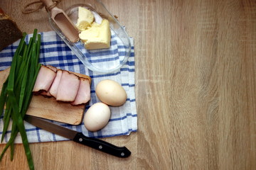 Quick breakfast products on wooden rustic table, top view with copy space for design