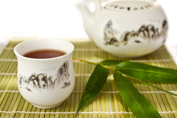Chinese tea set on bamboo mat
