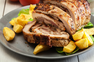 Roasted pork roll stuffed with other meat