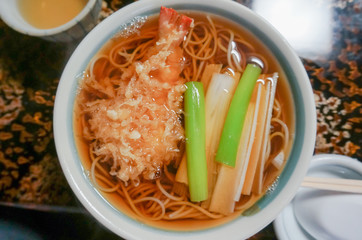 Hot buckwheat with shrimp Tempura , selective focus