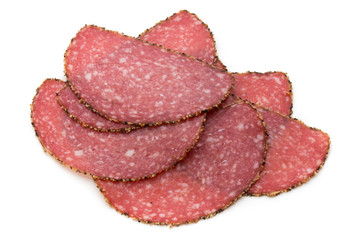 Salami slices isolated on the white background.