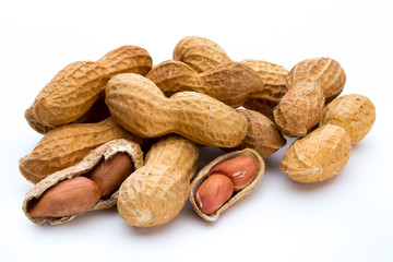 Dried peanuts on the white background.