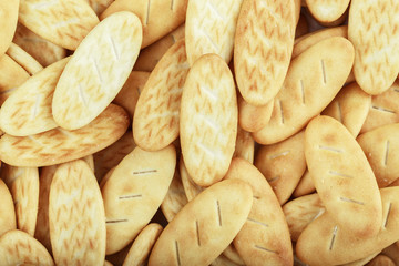 Biscuit sweet cookie cracker background. Domestic stacked butter biscuit pattern.junk food