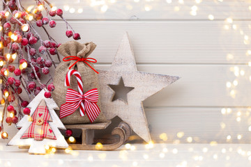 Christmas decor on the wooden white background.