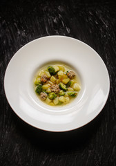 soup with meatballs, broccoli and vegetables