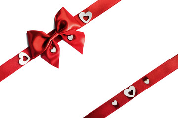 Red gift bow and hearts
