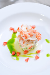 appetizer of tiger prawn shrimps on white plate