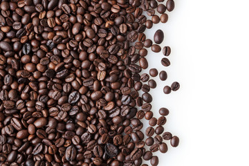 Roasted coffee beans on white background