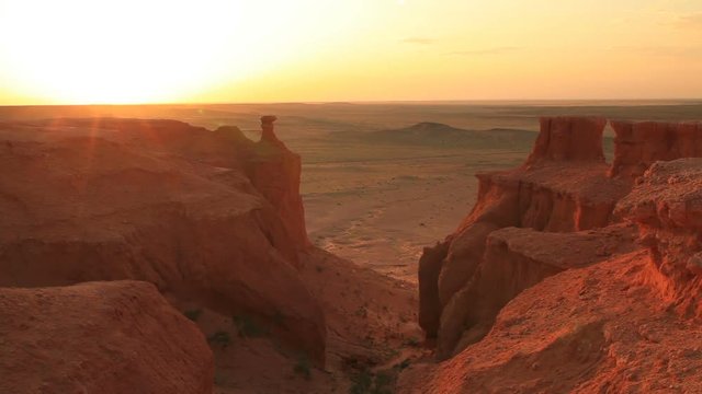 Sunset over the canyon Bayanzag in Mongolia